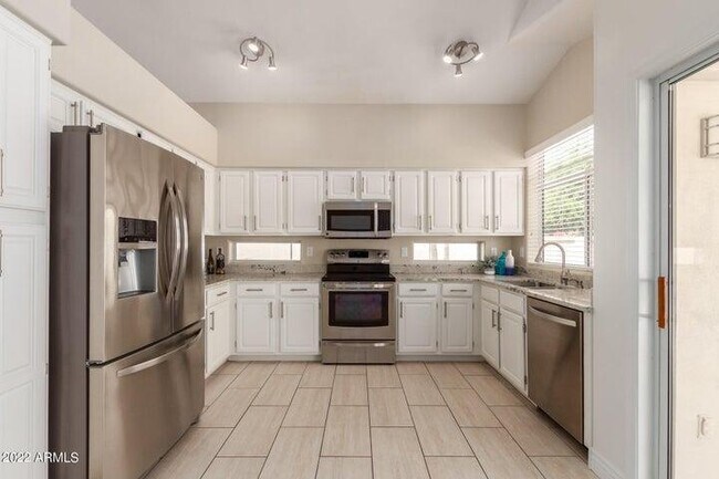 Building Photo - 11838 E Carol Ave