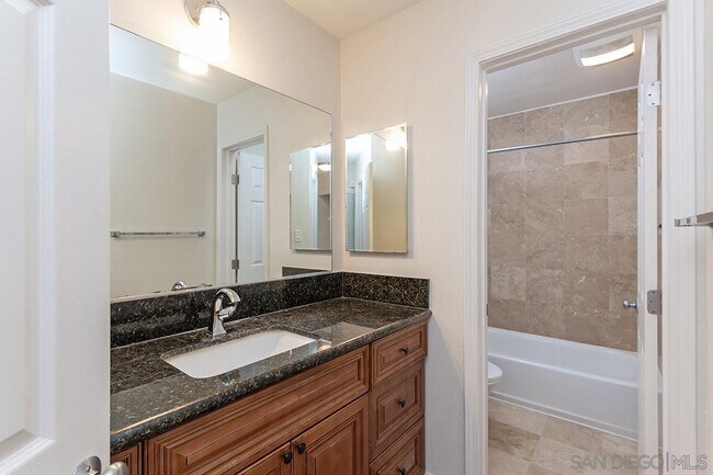 Building Photo - 7455 Charmant Dr