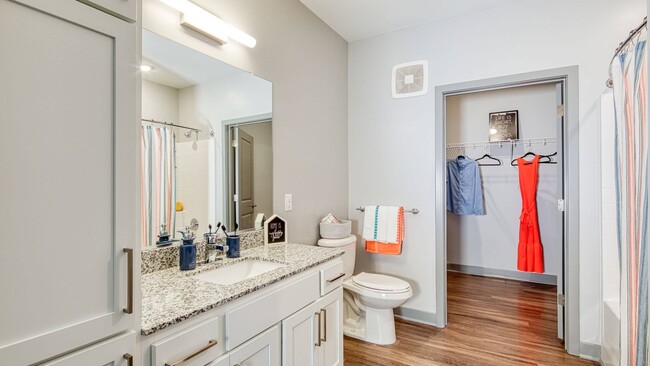 The Oval Zen inspired bathroom with walk in closet - Ellipse Urban Apartments