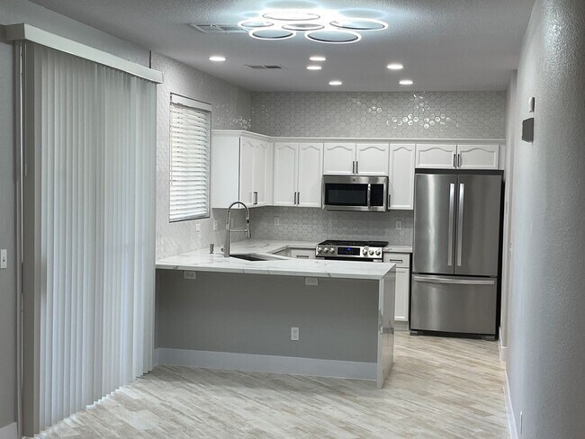 Building Photo - **GORGEOUSLY REMODELED & CLEAN!!  3BD-2 1/2BA HOME IN SILVERADO RANCH !!  *** ONLY $2,190 ***