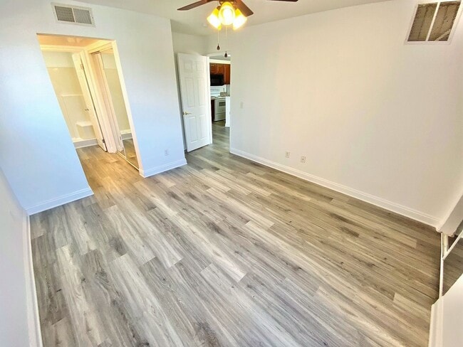Building Photo - CONDOMINIUM IN A GATED COMMUNITY WITH 2 BE...