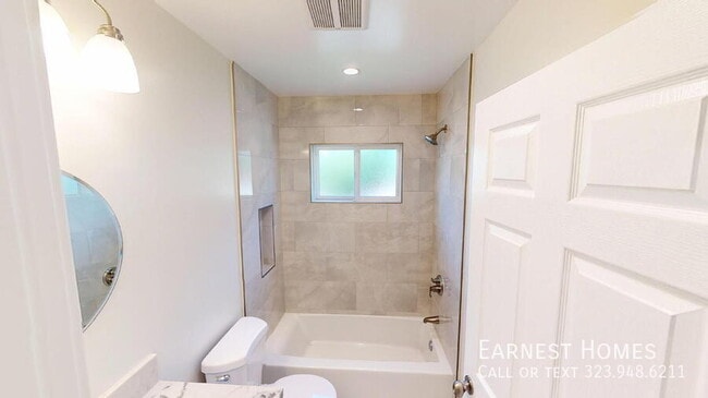 Building Photo - 8228 Laurelgrove Ave