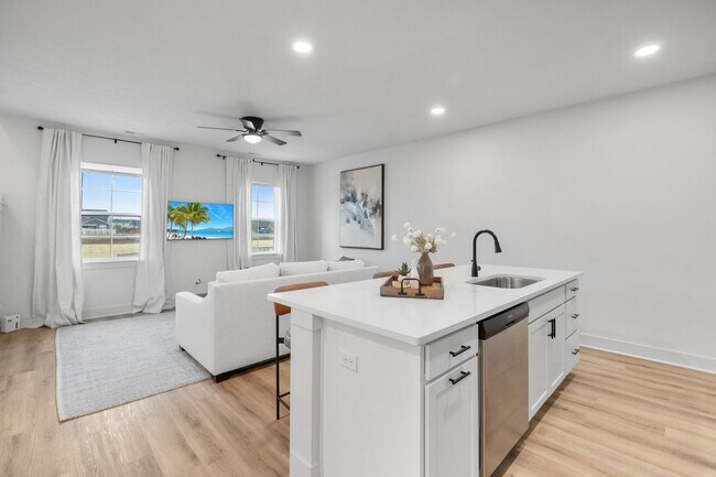 Building Photo - Brand New Three Bedroom Townhome in West L...