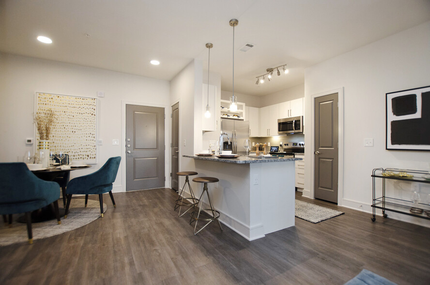 Kitchen and dining area with hard surface flooring - Avalon Frisco North