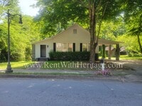 Building Photo - ENJOY THE PRESTIGE OF THIS CHARMING HOME I...