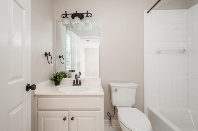Building Photo - Elegant Master-on-Main in Prestigious Laur...