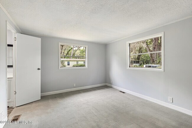 Building Photo - 1104 Harmony Dr N