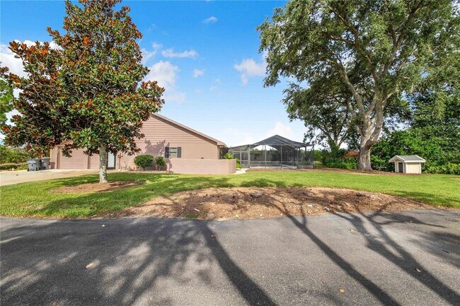 Building Photo - 7740 Lake Hatchineha Rd
