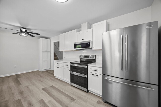 Building Photo - Fantastic Corner Lot, Updated 4 Bedroom Sp...