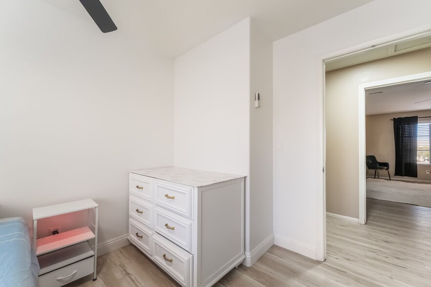 Hall featuring light wood finished floors and baseboards - 1179 Antoinette St
