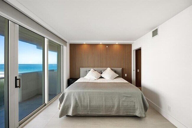 Building Photo - 9499 Collins Ave