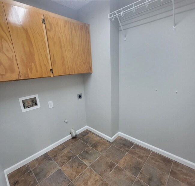 Main floor laundry room - 4311 E 41st Ave