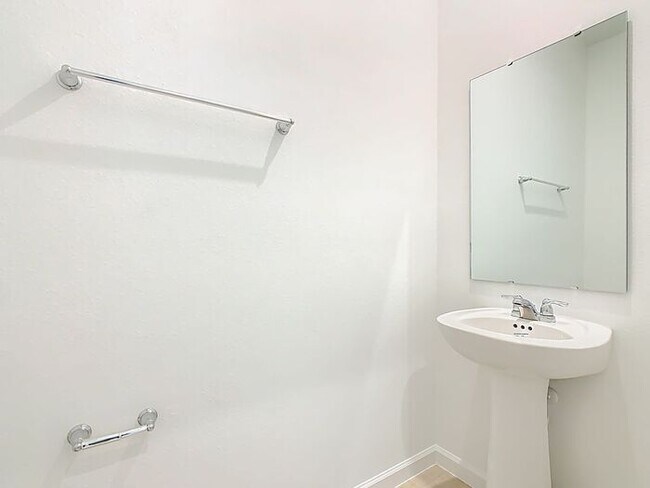 Building Photo - New Luxury Townhome in Celebration, FL Corner unit. All porcelain tiled floors. Aleutian model by...