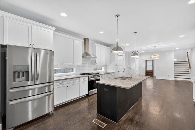 Building Photo - Beautiful 4 Bedroom in The Nations