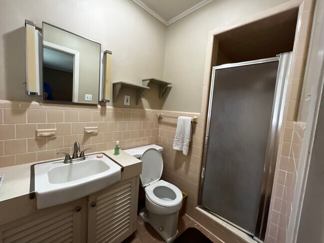 Building Photo - 3 Bedroom, 2 Bathroom, Brick home, Carport...