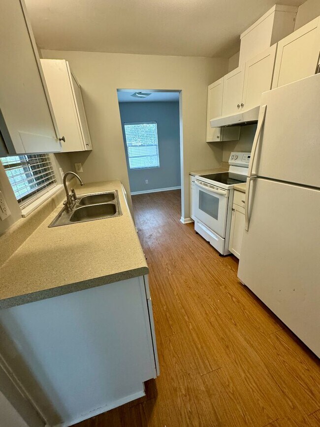 Building Photo - 3 bedroom home with large yard on the west end!