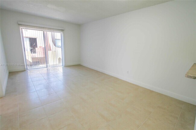 Building Photo - 3675 W 11th Ave