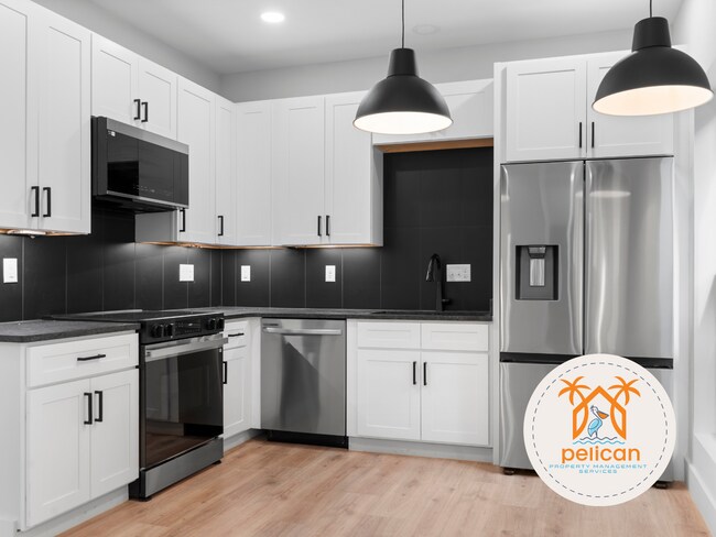 Building Photo - Striking 2BR / 2BA Home with Soaring Vaulted Ceilings