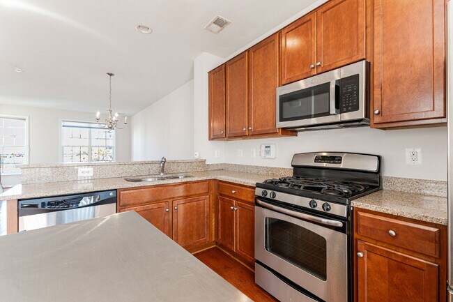 Building Photo - This beautiful townhouse has everything yo...