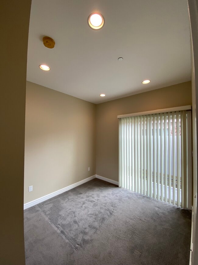 Bedroom 1 with sliding door to balcony - 1804 10th St