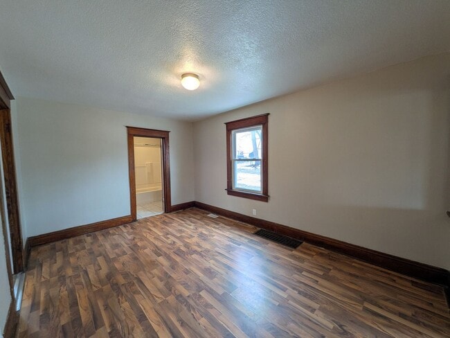 Building Photo - Large 4 Bedroom Home with Garage, Deck, & Fence!