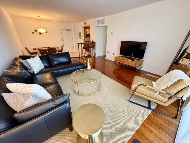 Building Photo - 10275 Collins Ave