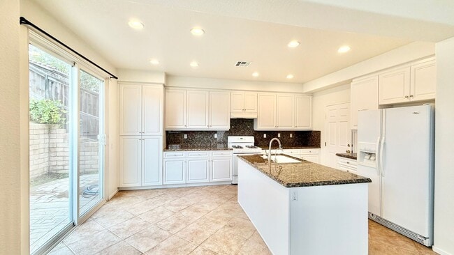 Building Photo - Beautifully Maintained & Spacious Two-Story Home in the Privately-gated Belleza Community of San ...