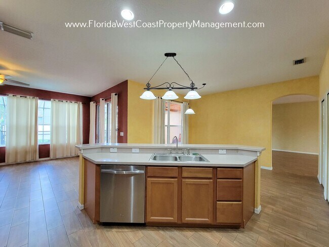 Building Photo - LARGE PARRISH POOL HOME! FENCED YARD! PET FRIENDLY! AVAILABLE FOR JUNE! LONG TERM LEASE!