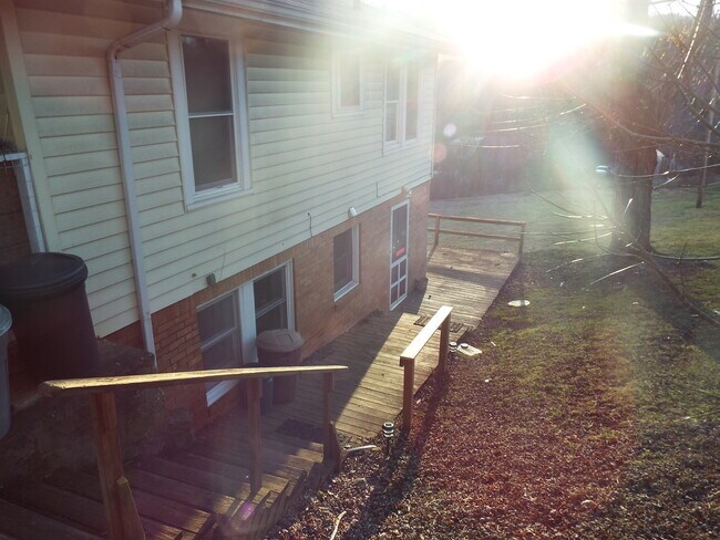 Building Photo - 2 Bedroom 1 Bath Basement Apartment in Historic Downtown Sylva $1300 a month with year-long lease.