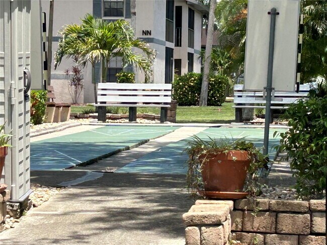 Building Photo - "2-Bed, 2-Bath Condo in Oaks IV - Your Cozy 899 Sq. Ft. Haven Awaits!"