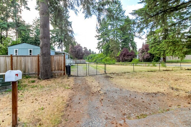 Building Photo - Updated 2 bedroom manufactured home on large corner lot