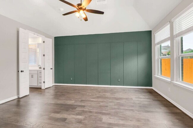 Building Photo - "Spacious 4-Bedroom Sanctuary with Cozy Fireplace in San Antonio's Prime Location!"