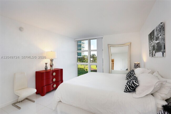 Building Photo - 10275 Collins Ave