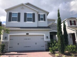 Building Photo - PRATICALLY BRAND NEW HOME IN GATED COMMUNITY!