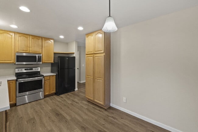 Building Photo - Spacious Split-Level Home with Finished Basement, Deck, Fenced Yard & 2-Car Garage