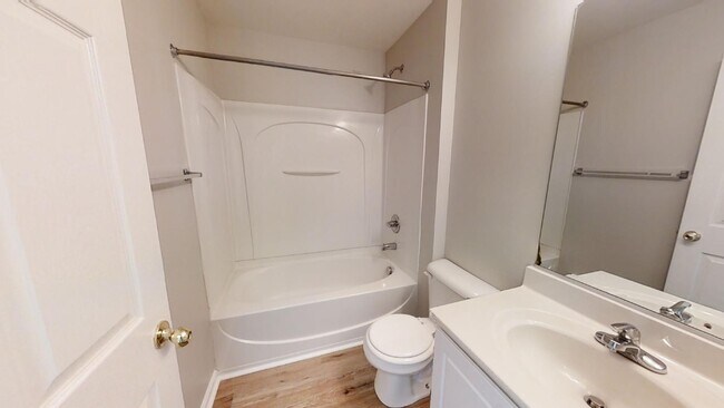 Building Photo - Townhome | Hard Surface Floors Through-Out...