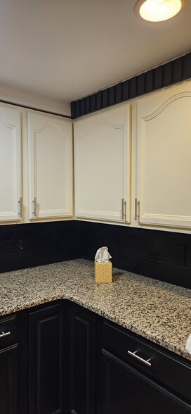 newly installed cabinet pulls - 4207 7th St NW