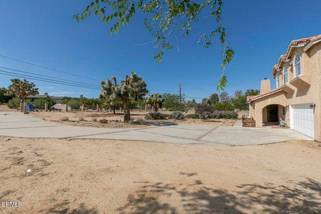Building Photo - 3831 E Ave T 8