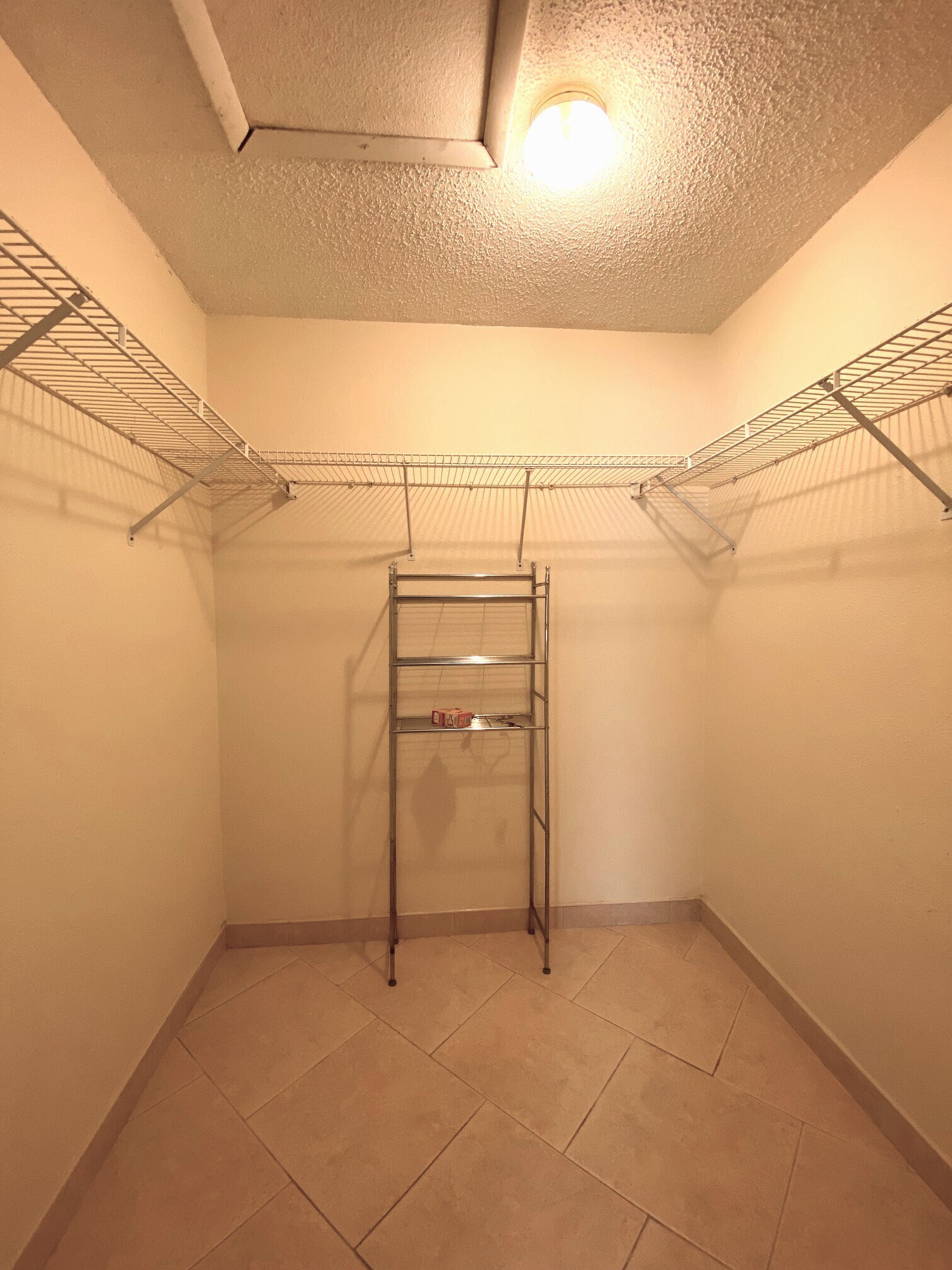 Master bedroom walk-in closet - 12225 Environmental Dr