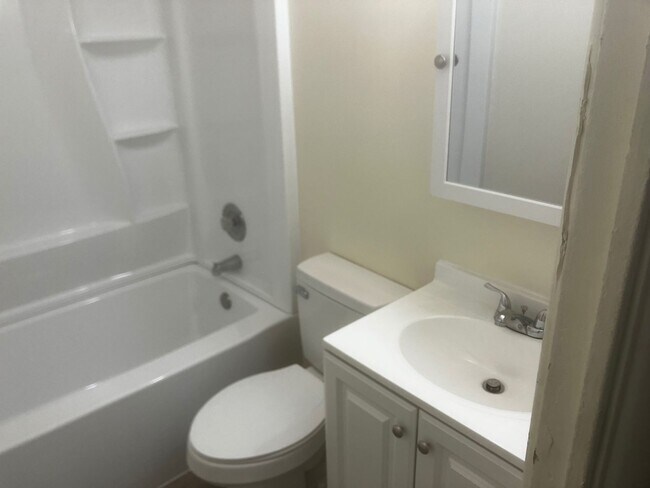 Building Photo - Charming 3BR Home with Beautiful Wood Floors