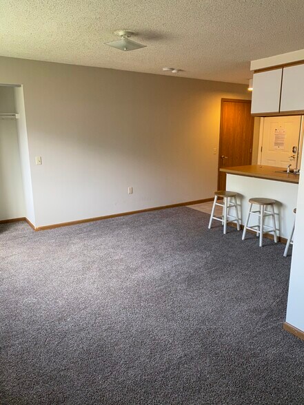Living looking toward kitchen - 101 S Shafer St