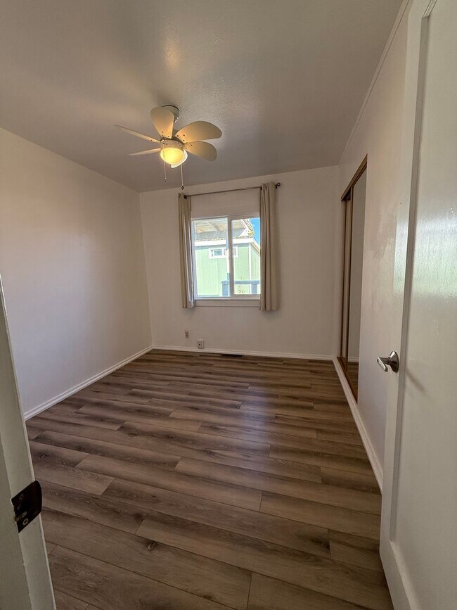 Building Photo - Hard floors, extra closets, patios & fenced yard