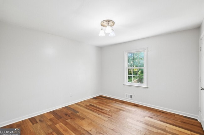 Building Photo - 5659 Whispering Pines Rd
