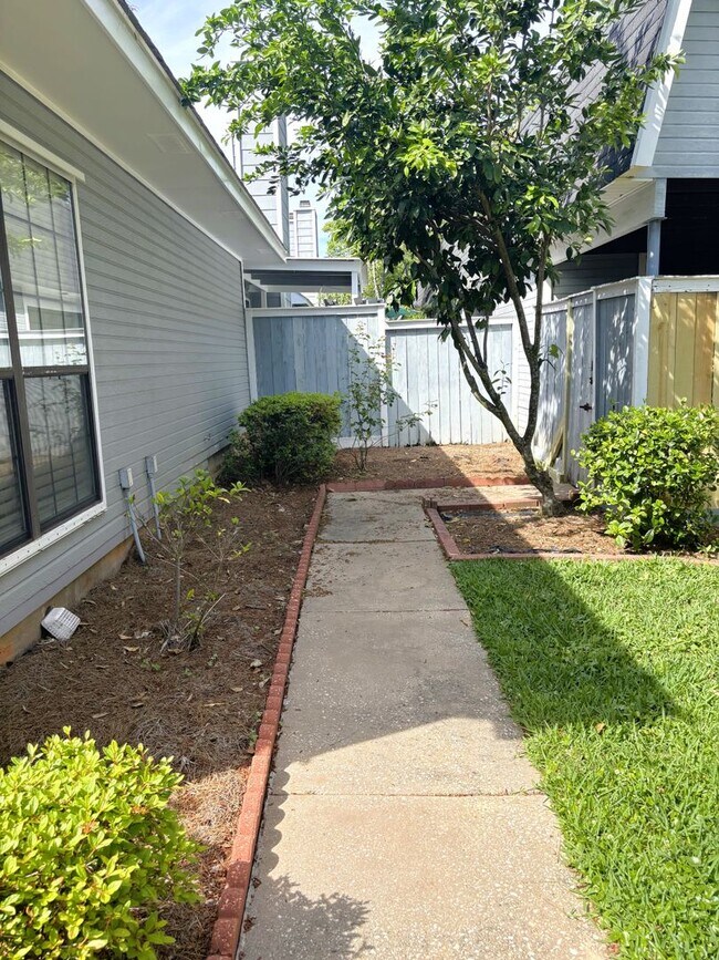 Building Photo - Two bed / Two bath condo off Grelot Road