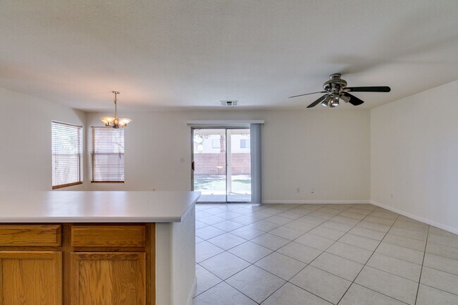 Building Photo - Spacious 4 Bedroom 2.5 Bathroom Home with Covered Patio & Large Backyard