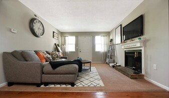 Living Room + Fireplace - British Woods