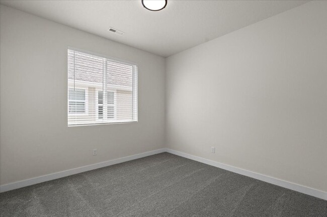Building Photo - Spacious 4-Bedroom Home with Modern Comforts
