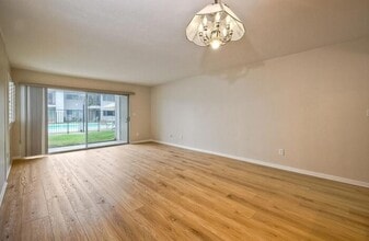 Building Photo - First-Floor 2BR Condo with Pool Access & Covered Parking in La Bonita