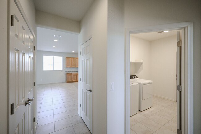 Building Photo - New 4 Bedroom + Den Home in Asante Community