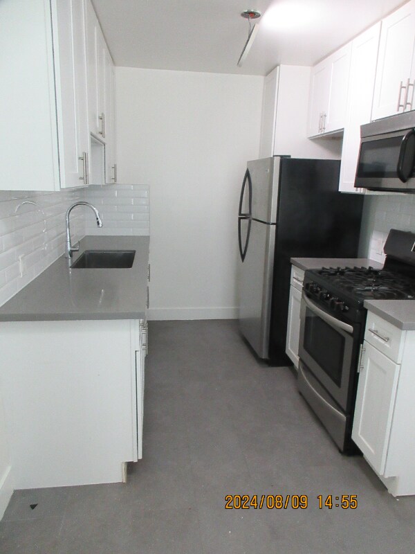 Building Photo - 905 N Sweetzer Ave